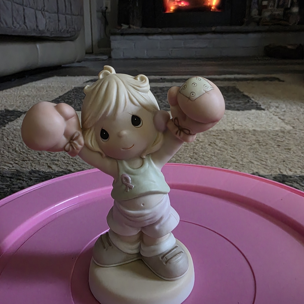 Precious Moments Life is worth fighting for breast cancer figurine